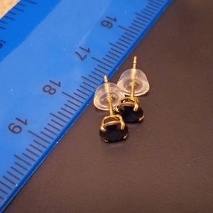 Solid 10k yellow gold stud earrings with 5 mm black zirconia, new, stamped